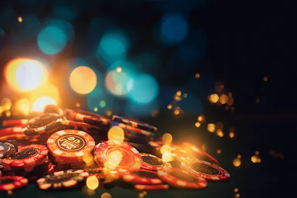 A confident dealer surrounded by casino chips inviting players to access their JILIX account, reflecting quick and easy login options.